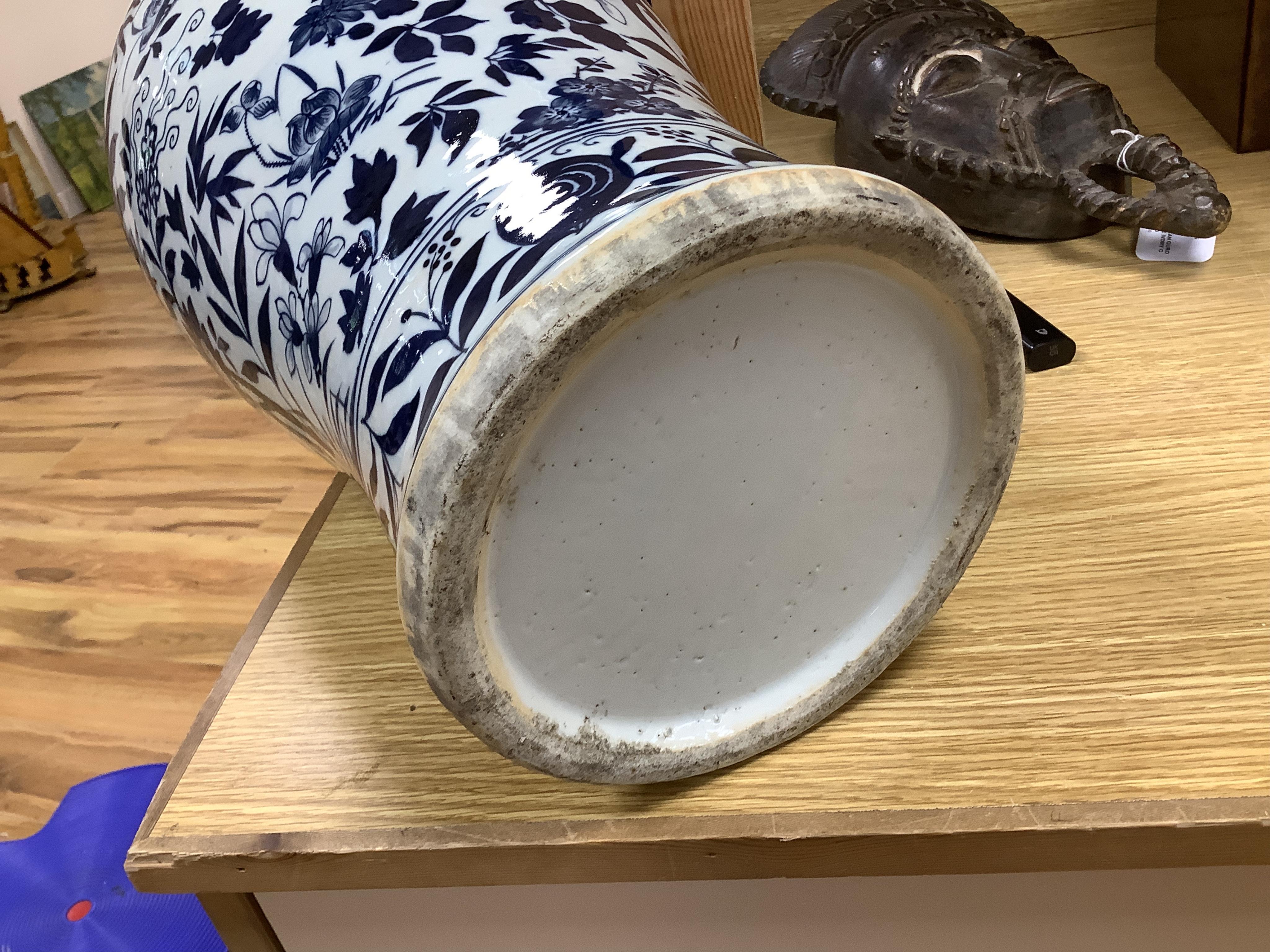 A large Chinese blue and white floral vase, 54cm high